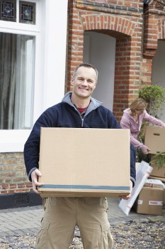 Residential moving boxes and furniture being prepared for a Finchley home move