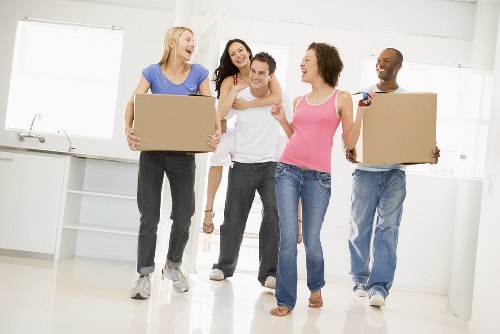 Removal team helping with a Finchley home move on a residential street