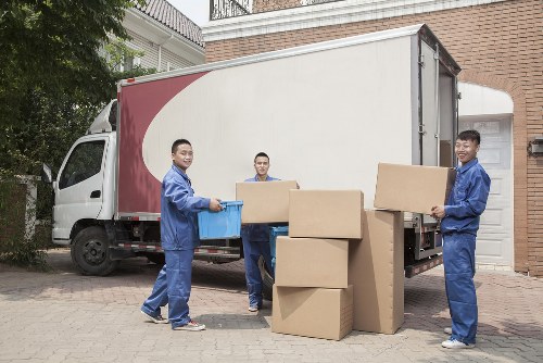 A home moving team loading items for a Finchley relocation