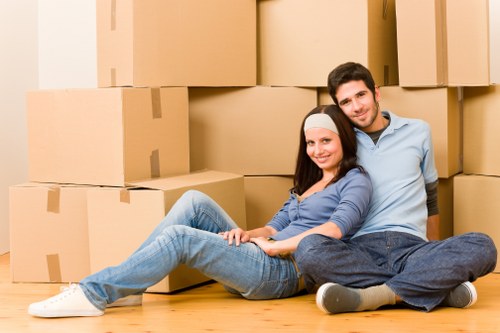 Man with a van loading furniture for a Finchley home move
