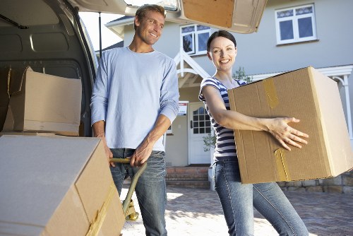 Man and van team handling furniture collection in Finchley